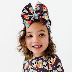 Baby Kids Bamboo Pajamas — Cosmic in Peace Biggie Bow — Image 1