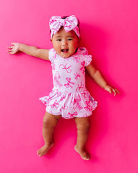 Baby Kids Bamboo Pajamas — Blushing Bows Cap Sleeve Ruffle Dress — Image 1