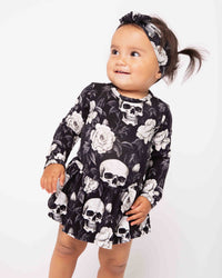Baby Kids Bamboo Pajamas — Bones and Roses Long Sleeve Ruffle Dress — Image 1