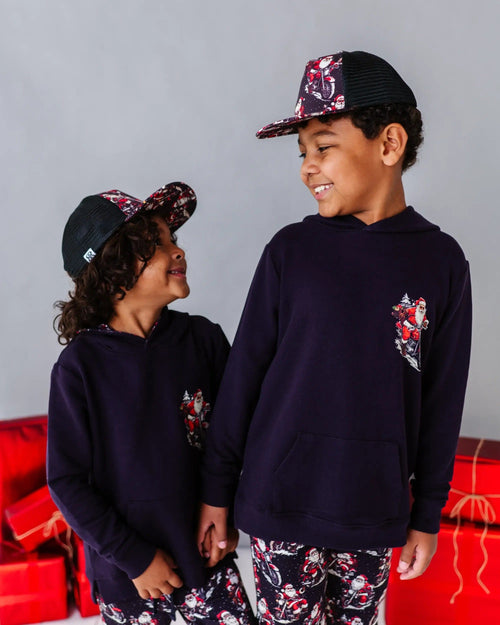 Baby Kids Bamboo Pajamas — Clausin' Trouble Hat — Image 10