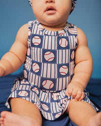 Baby Kids Bamboo Pajamas — Pitch Perfect Racer Back Ruffle Dress — Image 1