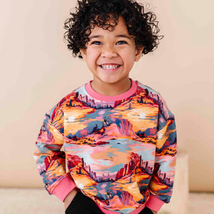 Baby Kids Bamboo Pajamas — Saddle Up Sunset Crew Neck Sweatshirt — Image 1