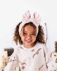 Baby Kids Bamboo Pajamas — Harry Potter™ Hedwig’s Flight Biggie Bow — Image 1