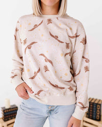 Baby Kids Bamboo Pajamas — Harry Potter™ Hedwig’s Flight Women's Sweatshirt — Image 1