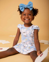 Baby Kids Bamboo Pajamas — Harry Potter™ Hedwig's Sky Mail Cap Sleeve Ruffle Dress — Image 1