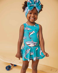 Baby Kids Bamboo Pajamas — Shark Week™ Jaws & Effect Racer Back Ruffle Dress — Image 1