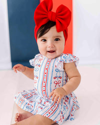 Baby Kids Bamboo Pajamas — Liberty & Bows for All Cap Sleeve Ruffle Dress — Image 1