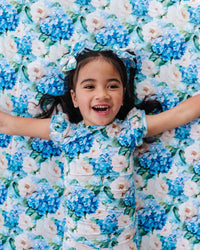 Baby Kids Bamboo Pajamas — Once in a Blue Bloom Ruffle Bum Bum Blanket — Image 1