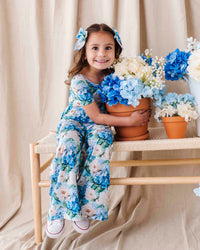 Baby Kids Bamboo Pajamas — Once in a Blue Bloom Short Sleeve Wide Leg Jumpsuit — Image 1