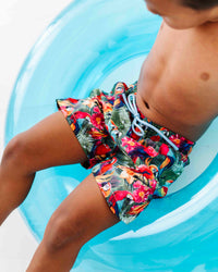 Baby Kids Bamboo Pajamas — Parrot-ise Found Swim Shorts — Image 1