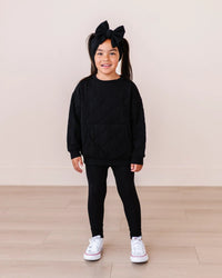 Baby Kids Bamboo Pajamas — Black Quilted Bubble Pocketed Sweatshirt — Image 1