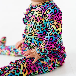 Baby Kids Bamboo Pajamas — Roarin' Rainbow Ruffle Footie — Image 1