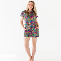Baby Kids Bamboo Pajamas — Roarin' Rainbow Women's Shortie Romper — Image 1