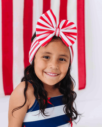 Baby Kids Bamboo Pajamas — Red Stripe Biggie Bow — Image 1