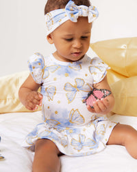 Baby Kids Bamboo Pajamas — Wish Upon A Wing Cap Sleeve Ruffle Dress — Image 1