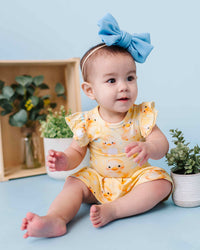 Baby Kids Bamboo Pajamas — You Quack Me Up Ruffle Dress — Image 1