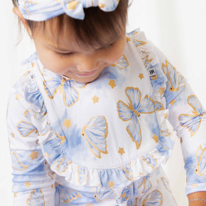 Baby Kids Bamboo Pajamas — Wish Upon a Wing Ruffled Bib — Image 1