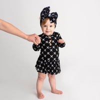 Baby Kids Bamboo Pajamas — X Marks The Spot Ruffle Dress — Image 1